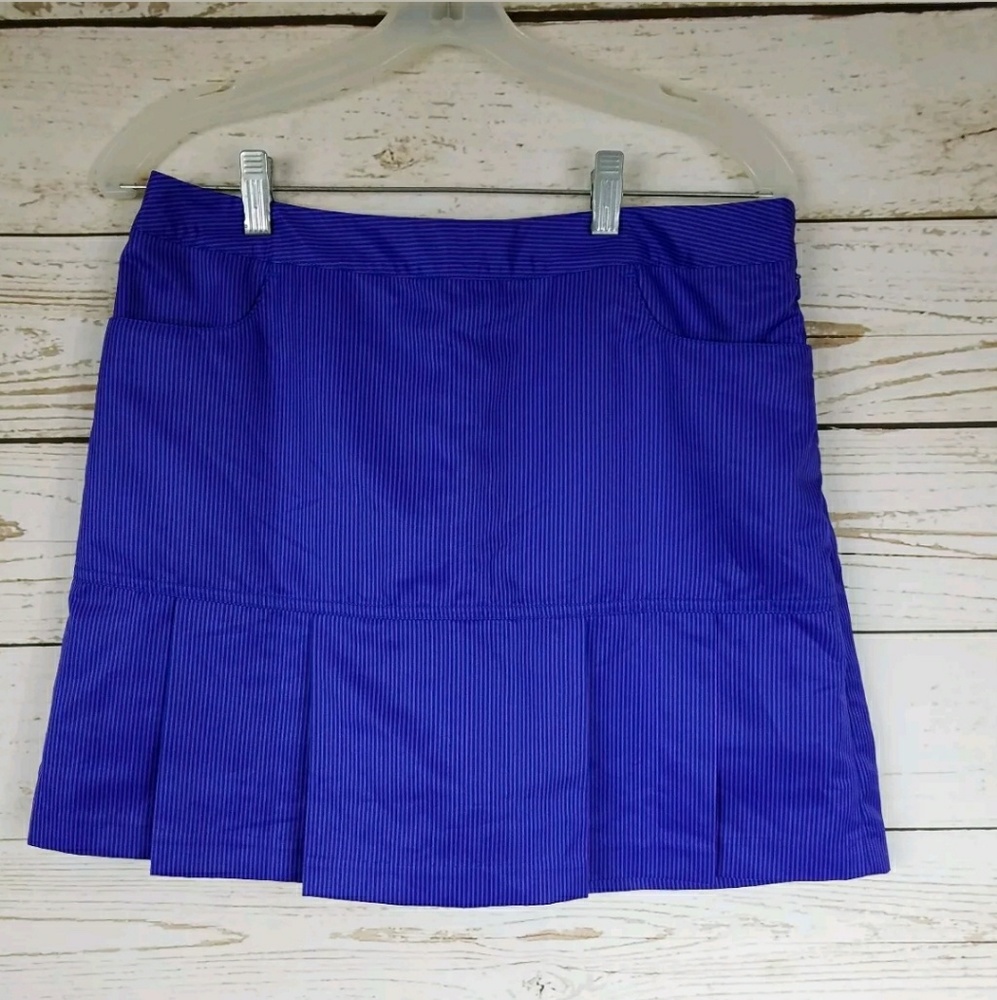 Adidas Women's Purple Pleaded Stripe Skort. 